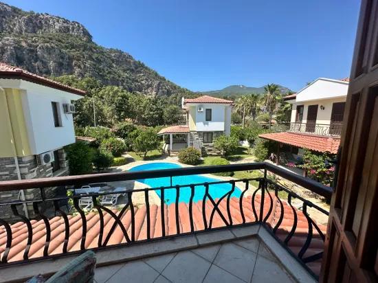 Dalyan In Gülpınar Innerhalb Der Anlage 2+1 Zu Verkaufende Villa