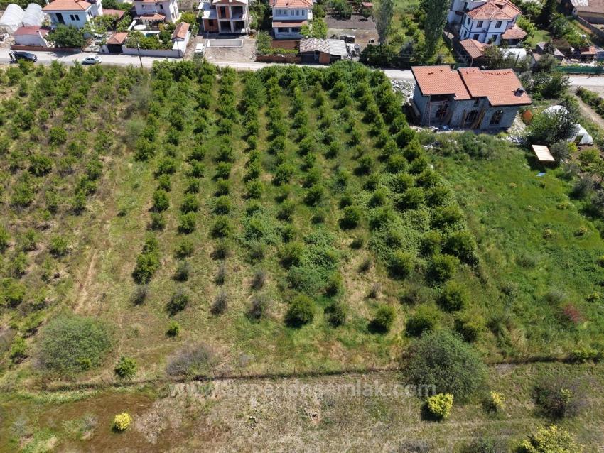 Land For Sale In Okçular, 1050M2, In The Village Residential Area.