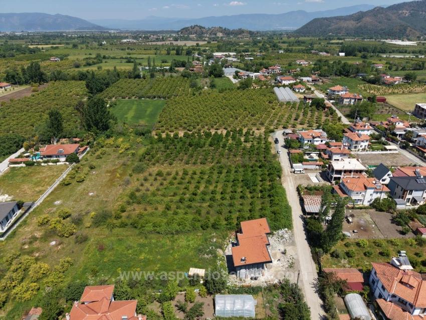 Land For Sale In Okçular, 1050M2, In The Village Residential Area.