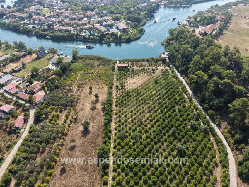 Село Köyceğiz в районе Çandır, у канала, 20.000м2 продажа поля